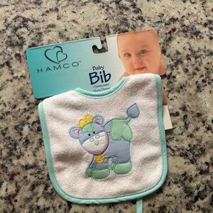 Vintage Hamco inc. blue cow print bib with string closure.